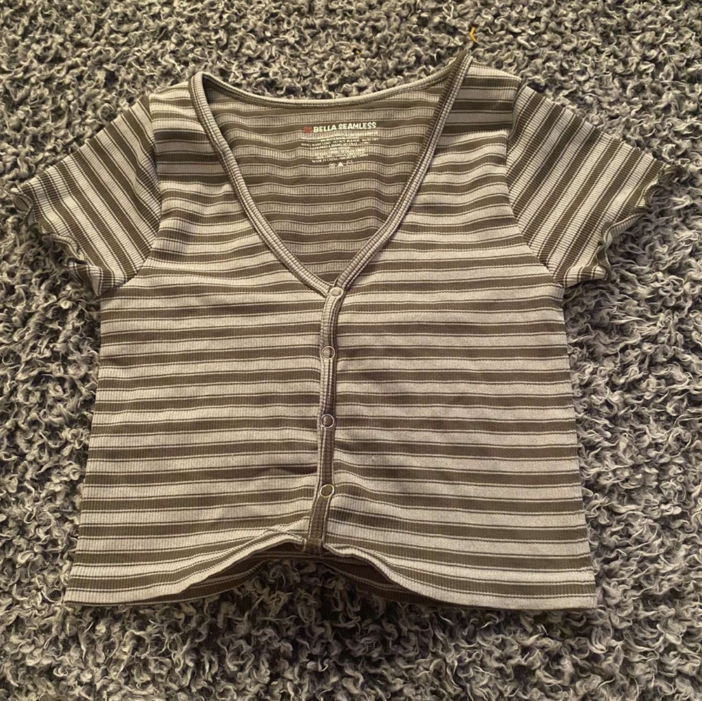 Green crop top with a slight v-neck.